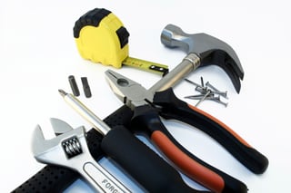 A variety of tools: hammer, pliers, etc.